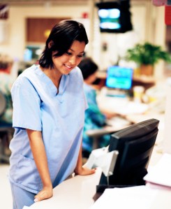 Female HCP viewing a computer screen